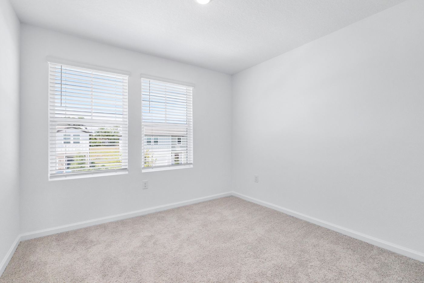 Secondary bedroom with a double window